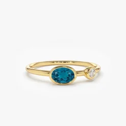 14k Gold Oval London Blue Topaz and Diamond Ring