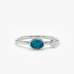 14k Gold Oval London Blue Topaz and Diamond Ring