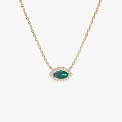 14k Marquise Emerald with Halo Diamond Setting