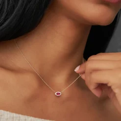 14k Marquise Ruby with Halo Diamond Setting