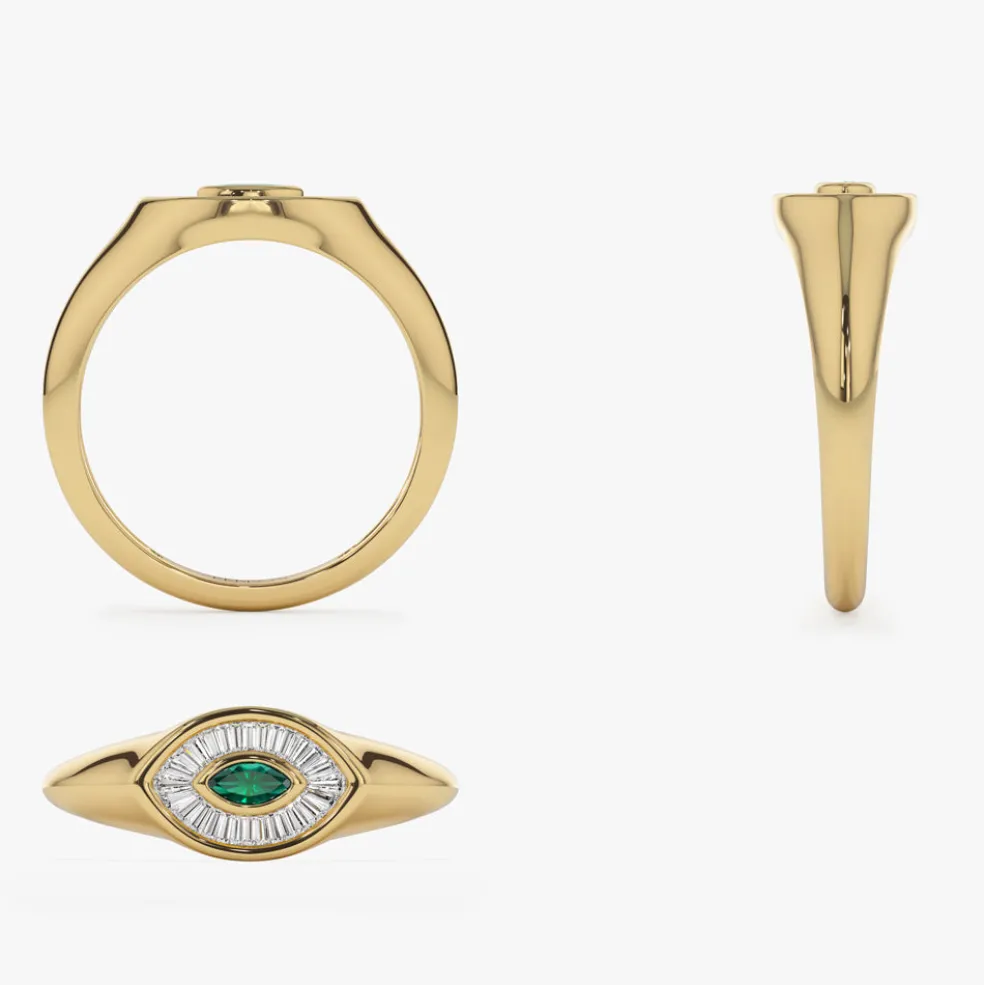 14k Marquise Shaped Emerald and Baguette Diamond Ring