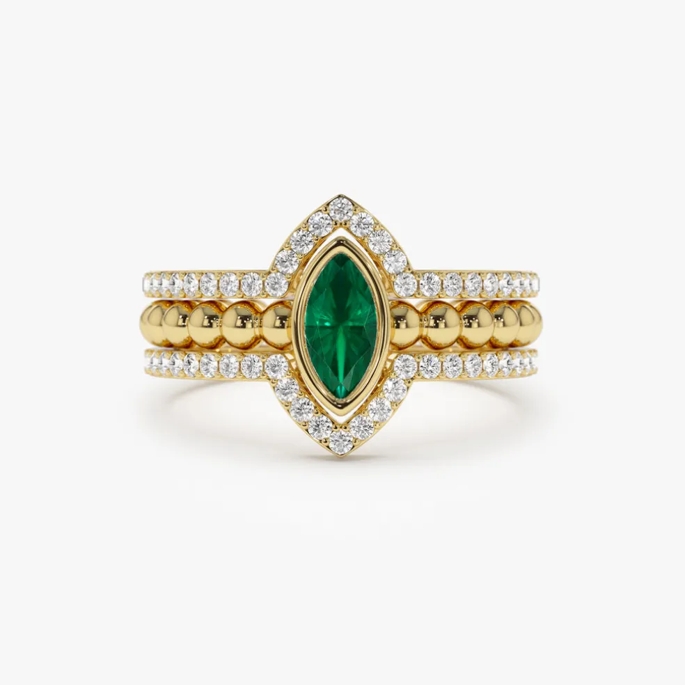 14k Marquise Shaped Emerald Ring with Nesting Diamond Bands