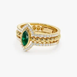 14k Marquise Shaped Emerald Ring with Nesting Diamond Bands