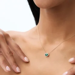 14k Oval Shape Emerald in Diamond Halo Setting