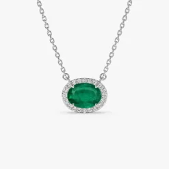 14k Oval Shape Emerald in Diamond Halo Setting