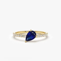 14k Slanted Pear Shape Sapphire Ring with Pave Diamonds